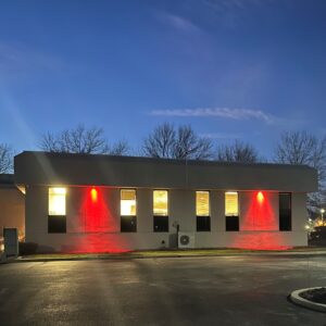 Bowman & Company LLP's Voorhees office lit up with red lights.